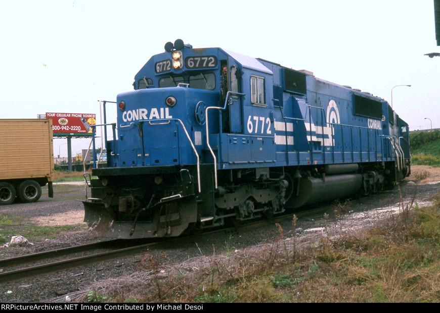 CR SD50 6772 leads the 1st unit stone train into the revamped facility at the old Port